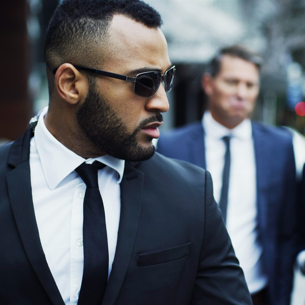 Bodyguard, walking and security for business people, protection and vip guests in city with surveil