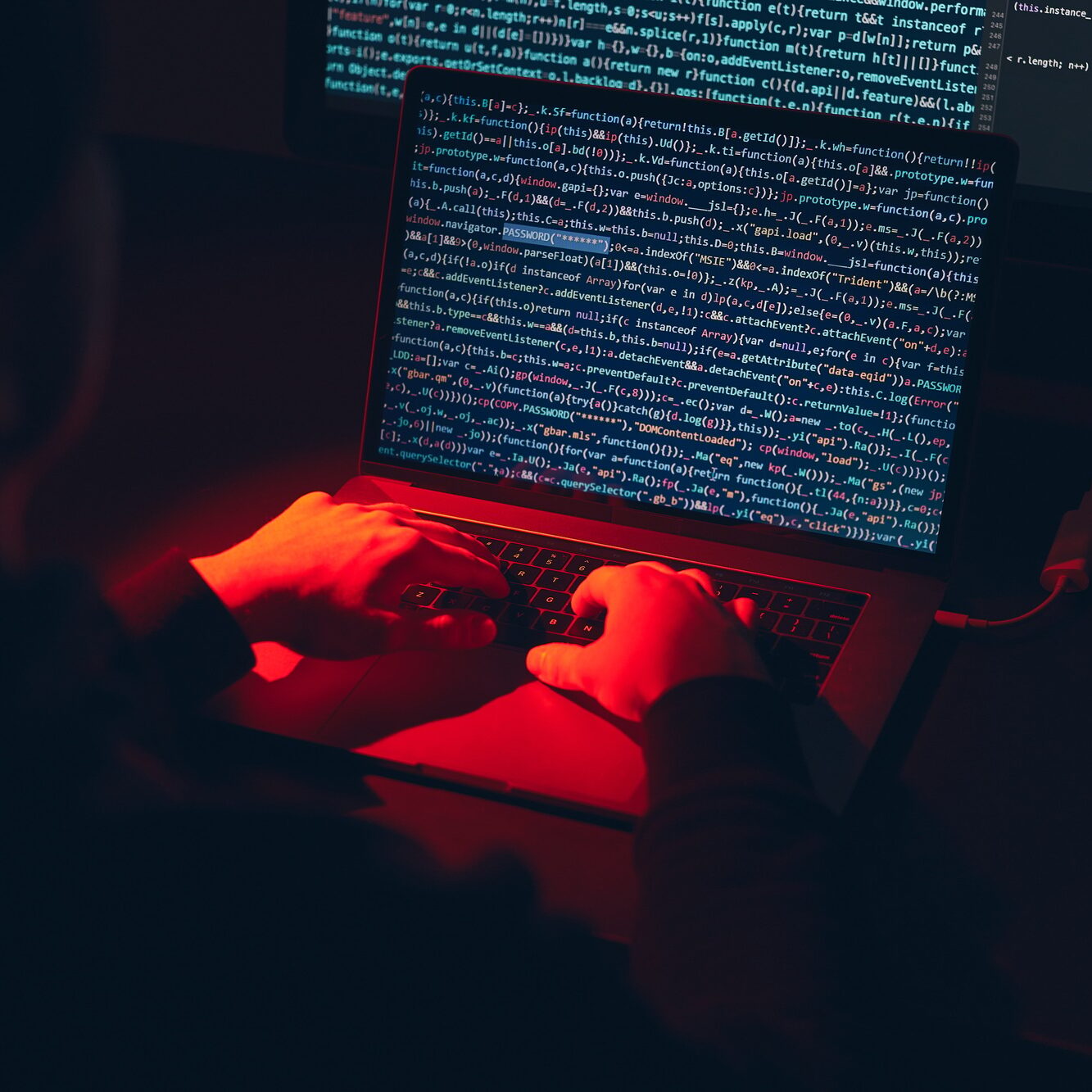 Man using computer and programming to break code. Cyber security threat. Net security