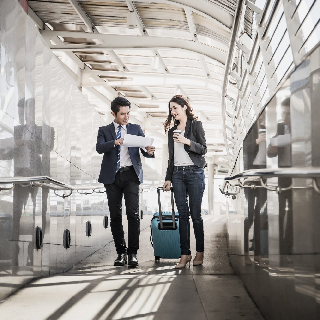 Portrait of two business people meeting before go to traveling. Business travel concept